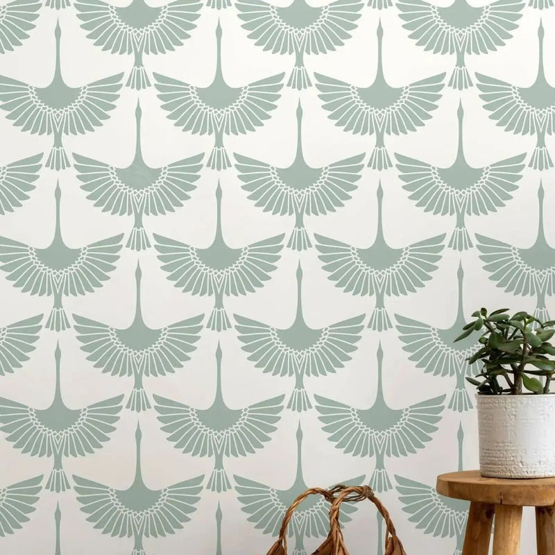 Papier peint tapisserie motif grues vert sauge — intissé mat premium